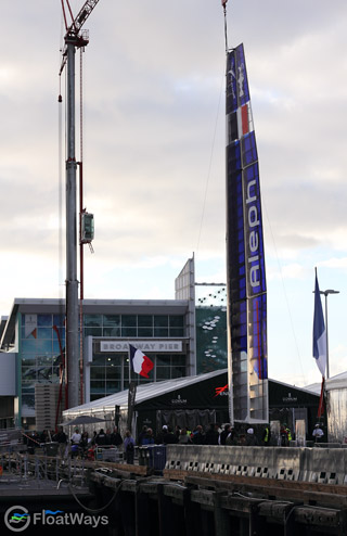 Giant Cranes Removing the Wing Sail for Storage